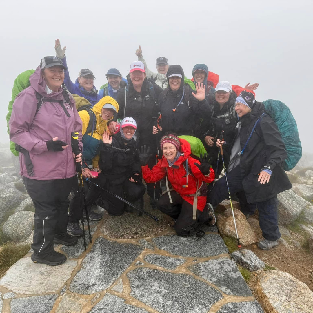 Couch to Mountain 2024 group at the summit